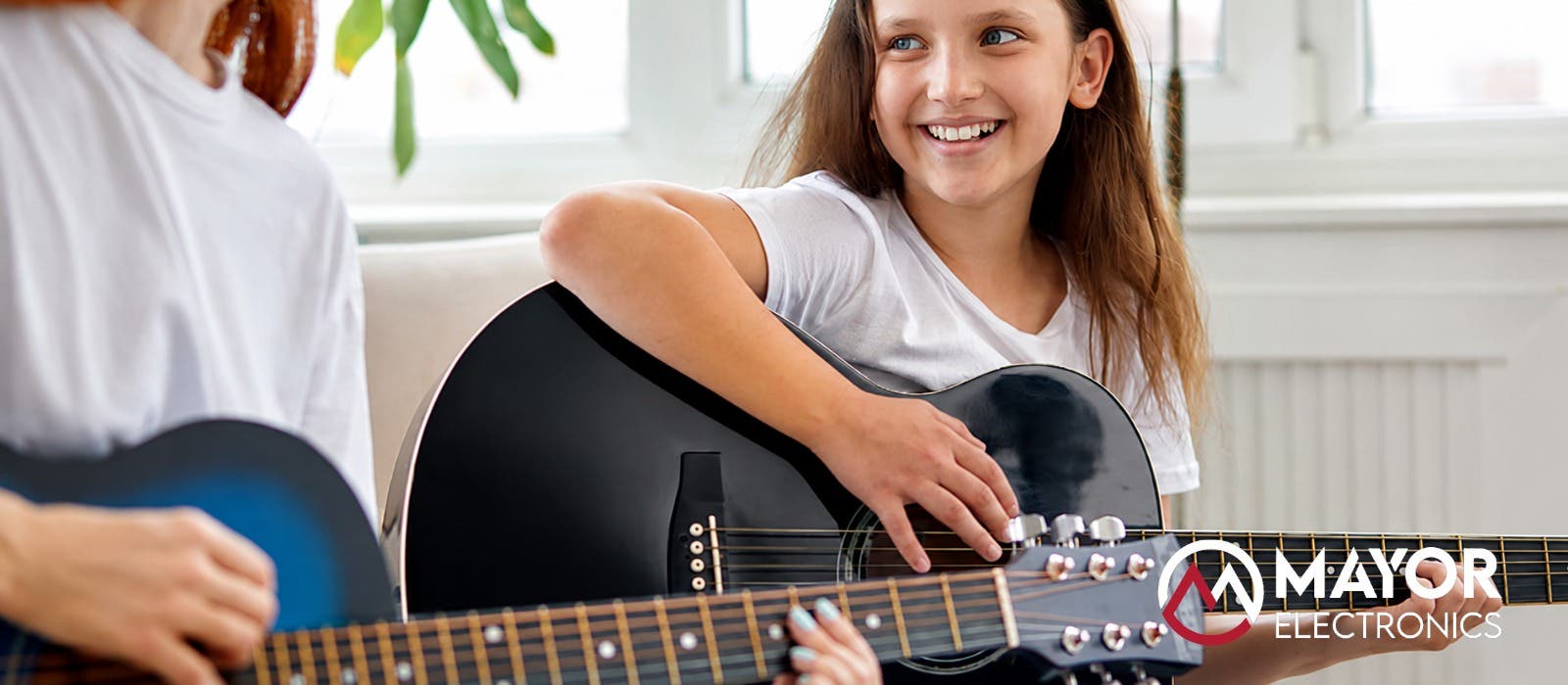 ¡Ayuda! ¿Qué tamaño de guitarra infantil debo elegir?